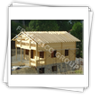 Maison avec murs obtenus par emboitement  en lamelle-colle composite - vue lors du montage