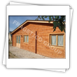 Maison avec murs doubles obtenus par emboitement en madriers ou lamelle-colle - vue exterieure